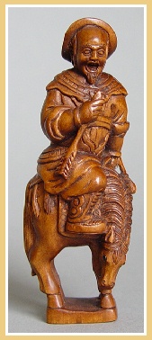 PALMHOUTEN NETSUKE&nbsp;KRIJGER TE PAARD. JAPAN.