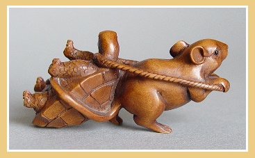 PALMHOUTEN NETSUKE RAT TREKT SCHILDPAD. JAPAN.