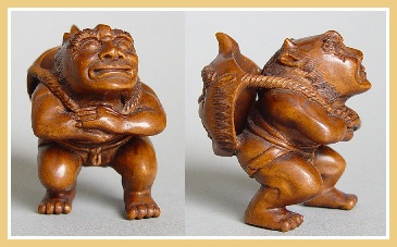 PALMHOUTEN NETSUKE ONI MET MASKER. JAPAN.