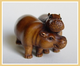 PALMHOUTEN NETSUKE -Twee Nijlpaarden -