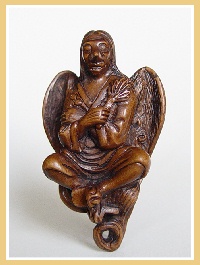 PALMHOUTEN NETSUKE VOGELGOD. JAPAN.