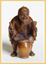 PALMHOUTEN NETSUKE WIJNVERKOPER. JAPAN.
