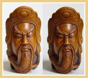 PALMHOUTEN NETSUKE KWAN MASKER. JAPAN.