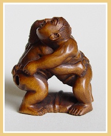 PALMHOUTEN NETSUKE 2 WORSTELENDE SUMO'S.JAPAN.