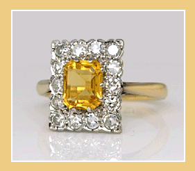 Antieke Platina en 18K. Gouden Ring met Diamanten en Gele Saffier.